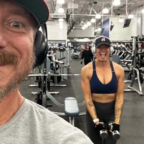 Geoff and Jenn training in the gym